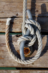 Close-up of a rope tied to a cleat
