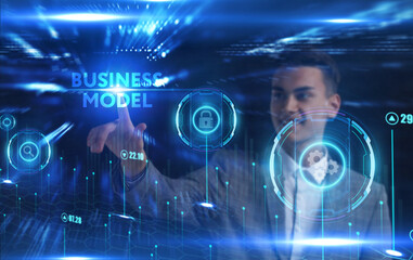 Business, Technology, Internet and network concept. Young businessman working on a virtual screen of the future and sees the inscription: Business model