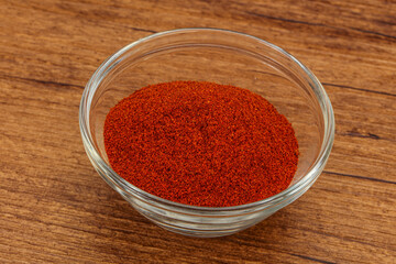 Dry paprika powder in the bowl