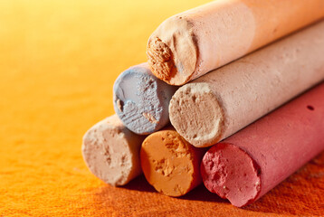 Closeup photograph of color chalks.