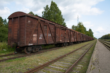Fototapeta na wymiar Railroad scene with cargo train.