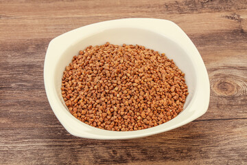 Raw buсkwheat cereal in the bowl