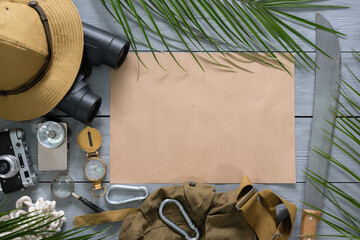 Treasure map mockup. Tourist equipment on the table flat lay background.