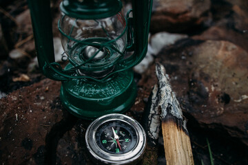 
compass with lamp stand on the rock