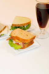 High angle view of sandwiches and a cola beverage