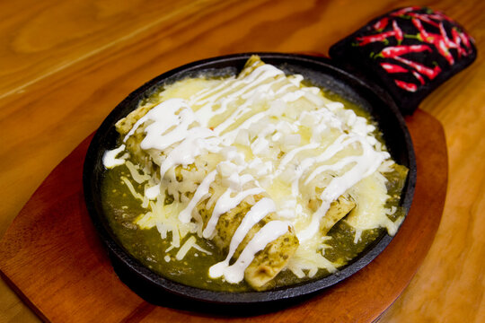 Close-up Of Enchiladas In A Plate