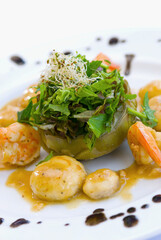 Salad stuffed artichoke served with baby potatoes