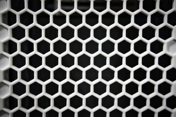 black and white plastic hexagon, honeycomb background