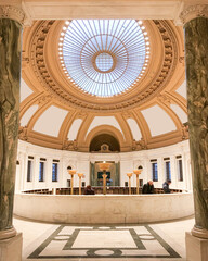 Hall or lobby of historic public building with oval glass dome or rotunda