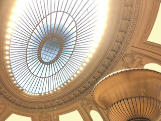 Hall or lobby of historic public building with oval glass dome or rotunda