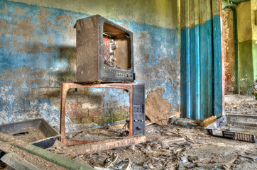 broken TV, in the old abandoned room