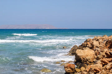 Fototapeta na wymiar The sea waves off the coast of Crete, Greece