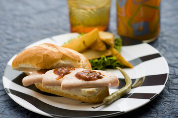 Close-up of a salami and salsa sandwich