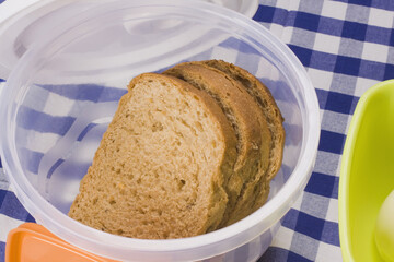 Close-up of brown bread slices in a box