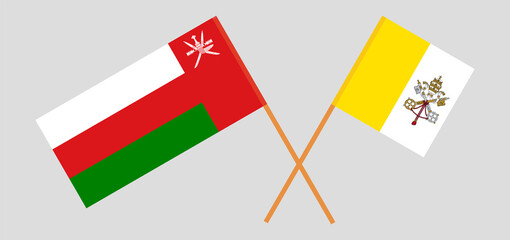 Crossed flags of Vatican and Oman