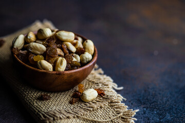 Healthy nuts on dark background