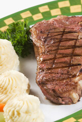 Close-up of steak and mashed potatoes