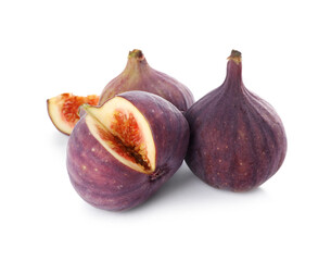 Whole and cut tasty fresh figs isolated on white