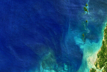 Sea taken from space, detailed Earth surface on global satellite photo. Elements of this image...