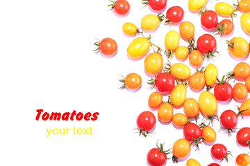 Obraz premium Red and yellow cherry tomatoes isolated on white background. Food background top view. Place for text