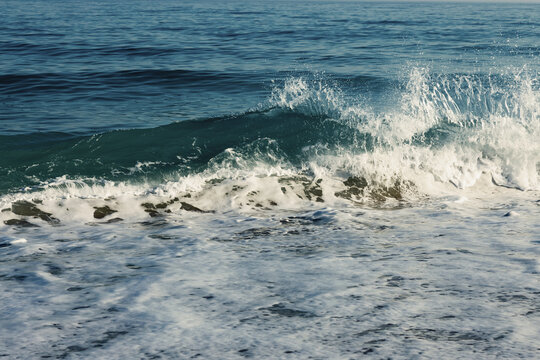 Seascape, Wave in movemen. Big stormy ocean wave. Blue water background