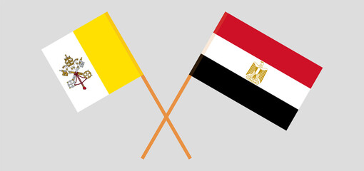 Crossed flags of Vatican and Egypt