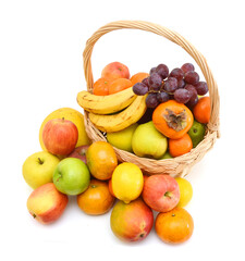 basket with fruits isolated on white