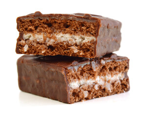 Slices of a brownie on white background covered with