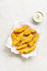 Crispy fried breaded chicken breast strips