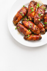 Bacon wrapped grilled chicken wings