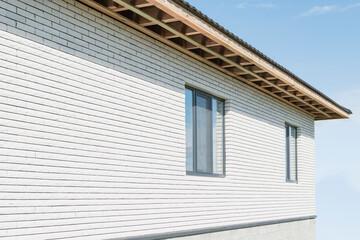 New house under construction with new Windows