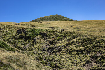 Beautiful highland landscapes in Volcans d'Auvergne regional Natural Park. Massif Central, Auvergne-Rhone-Alpes administrative region, France.