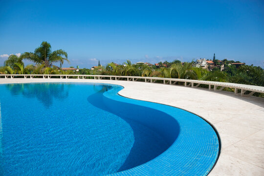 Ornate pool overlooking tropical hills