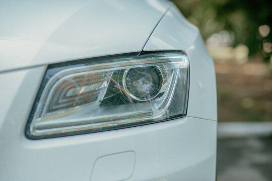 closeup of a white car sidelight in daylight. High quality photo