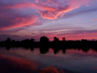Beautiful colorful sunset reflected in the river.