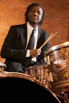 African man playing drums