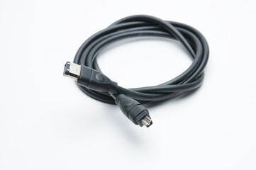 Cable with 1394 and iLink plugs on white background