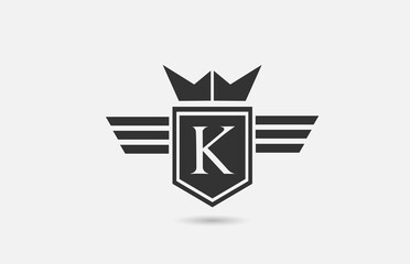 K alphabet letter logo icon for company in black and white. Creative badge design with king crown wings and shield for business and corporate