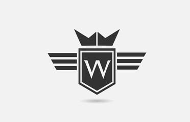 W alphabet letter logo icon for company in black and white. Creative badge design with king crown wings and shield for business and corporate