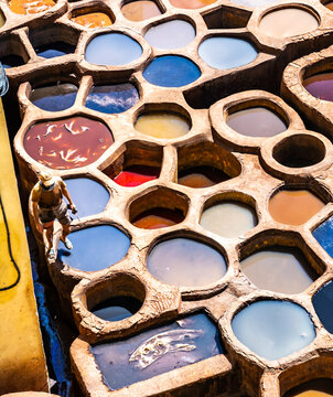 Old tanks of the Fez's tanneries with color paint for leather. Chouara Tannery is the oldest still working dates from 11th century in Fez, Morocco, Africa