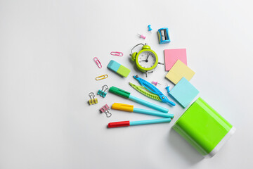 Flat lay composition with school stationery on white background, space for text. Back to school