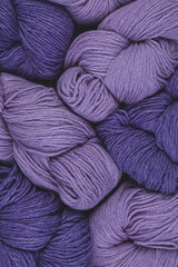  lilac wool skein of yarn pattern. love knitting and hand made concept. woman's hobby. View from...