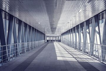 Long corridor to the railway station platform.