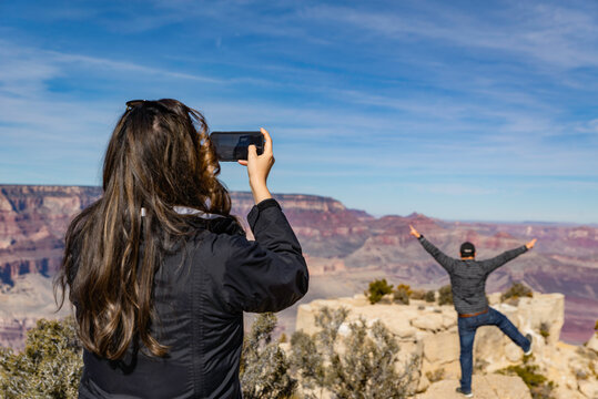  Tourists taking pictures at the Grand Canyon, Arizona, USA