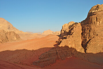 Fototapeta na wymiar Sand valley and rocks of Wadi Rum desert