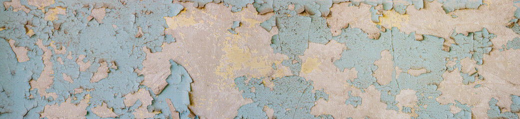 Large format wall texture with blue cracked paint