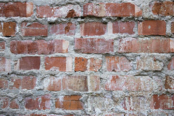 brick wall texture with gray concrete between bricks