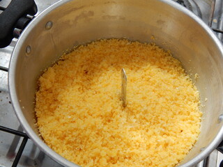 Traditional Brazilian couscous (cuscus/cuscuz). Tropical food. The Brazilian Couscous from the Northeast Region also known as Corn Couscous is a nutritious, cheap and a really simple recipe to make.