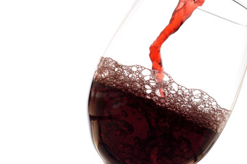 Close-up of wine being poured into a wineglass