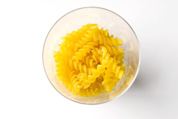 High angle view of raw fusilli pasta in a bowl
